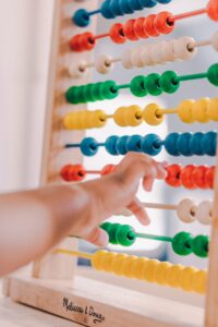 playing with beads helps children develop fine motor skills